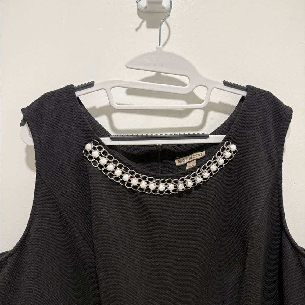 Elegant Black Dress with Beaded Neckline